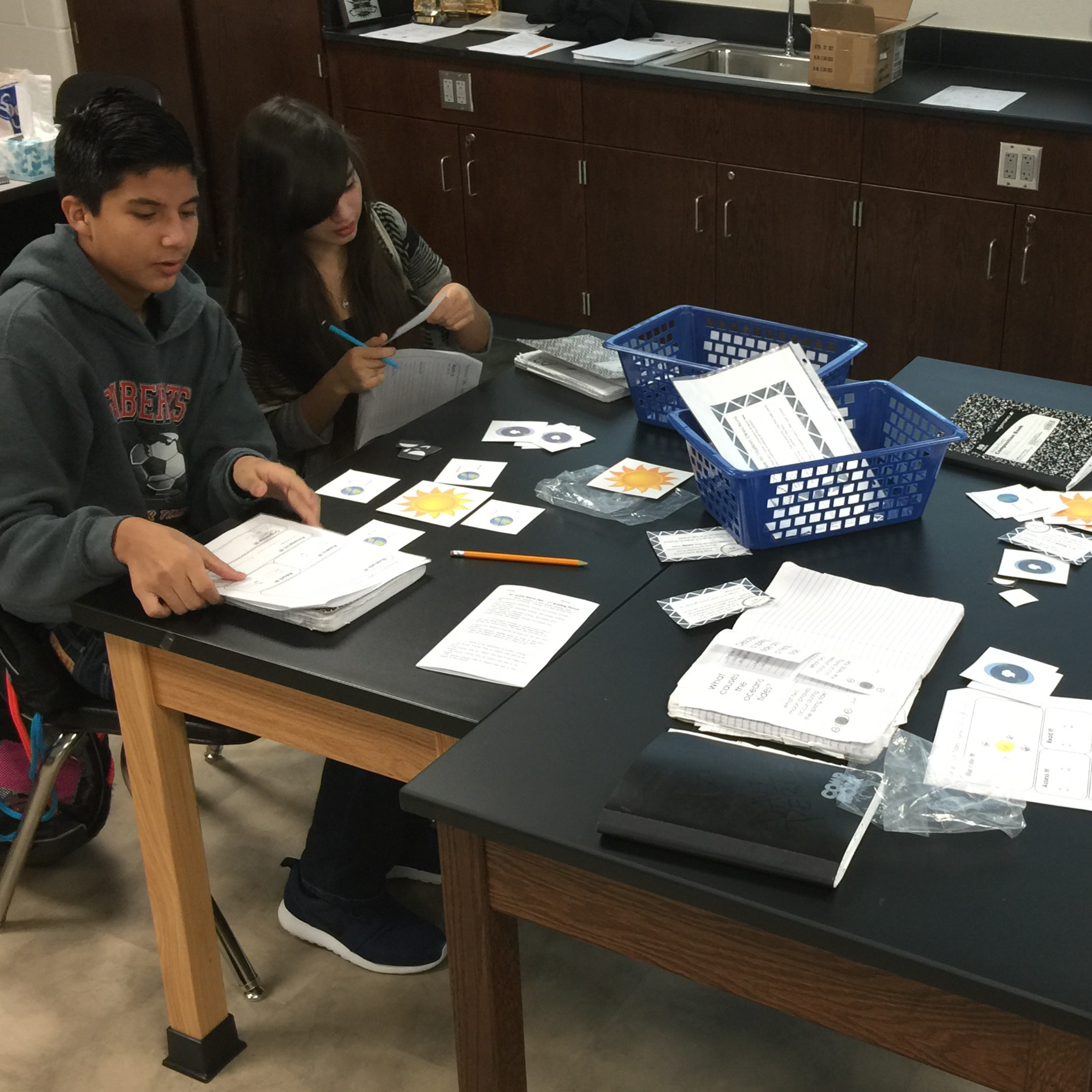 Students working with science materials